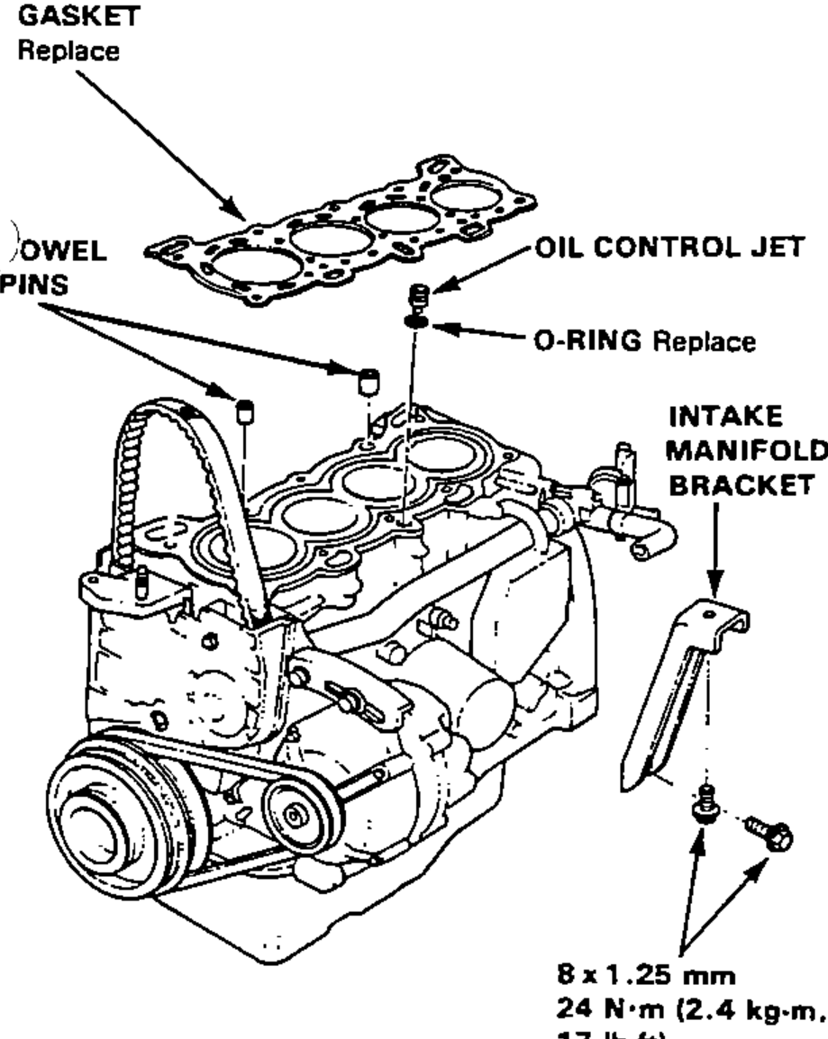 Exploded view of the cylinder head onto the engine block, showing the cylinder head gasket, dowel pins, oil control jet with O-ring, timing belt, crankshaft pulley and the intake manifold bracket with its mounting bolt.