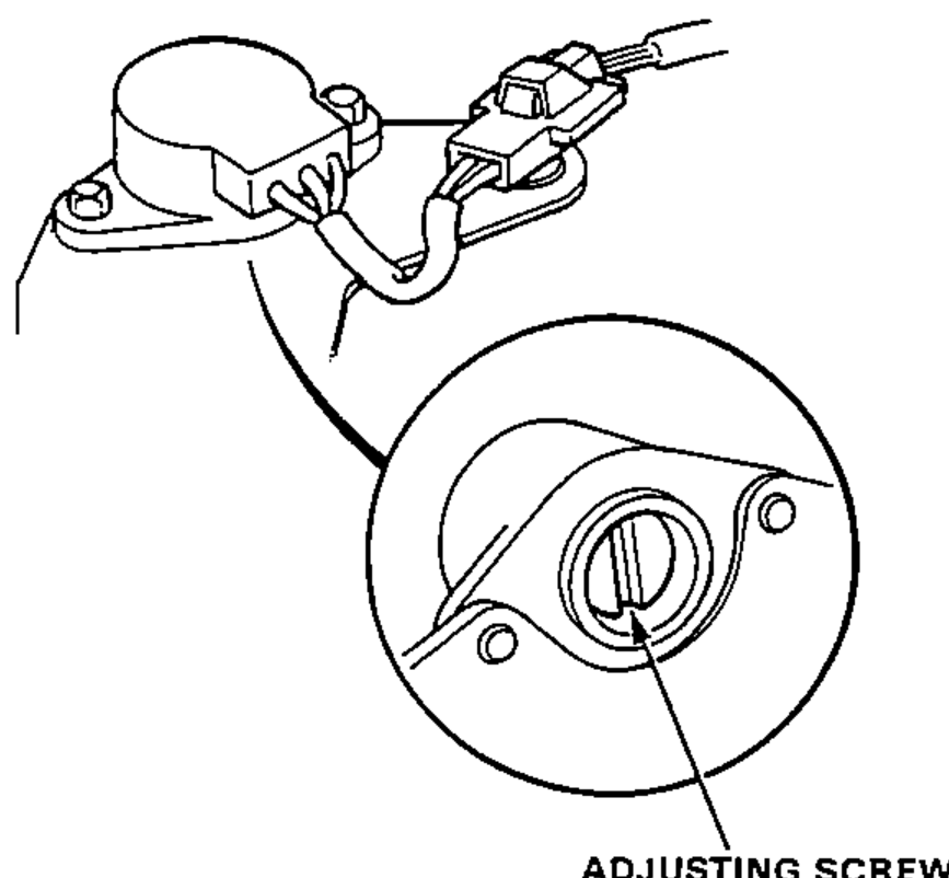Idle mixture adjuster (IMA) sensor with a magnified inset showing the adjusting screw used to adjust CO on models without CATA.