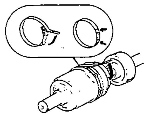 Boot band locking tabs being tapped over to reduce height; inset shows doubled-over portions of the bands.