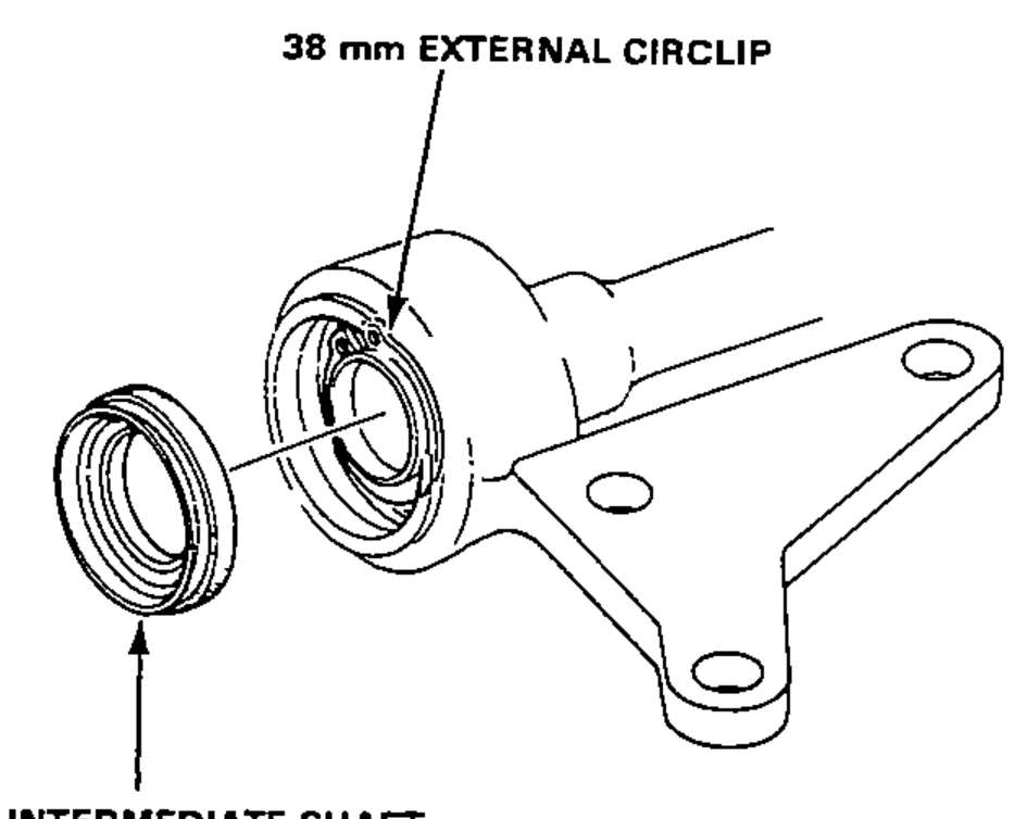 Intermediate shaft bearing support with the outer seal removed and the 38 mm external circlip being taken off the bearing.