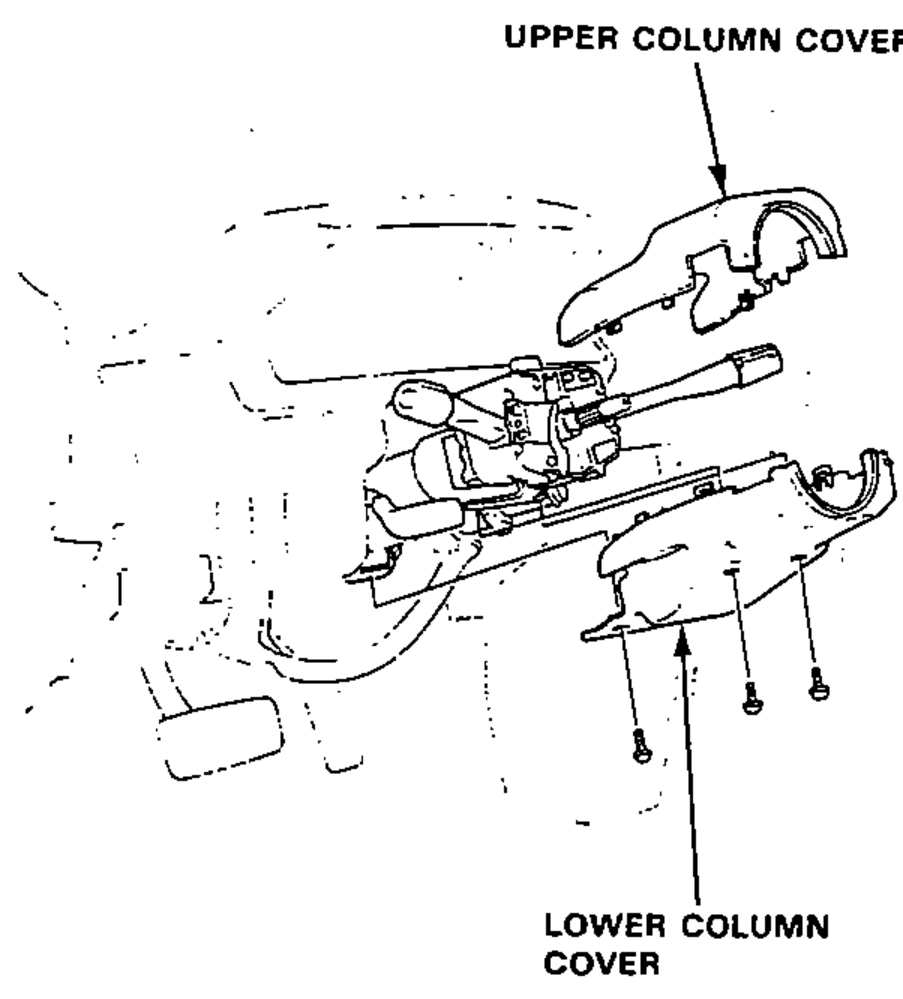 Steering column with the upper and lower column covers removed, showing the combination switch beneath.