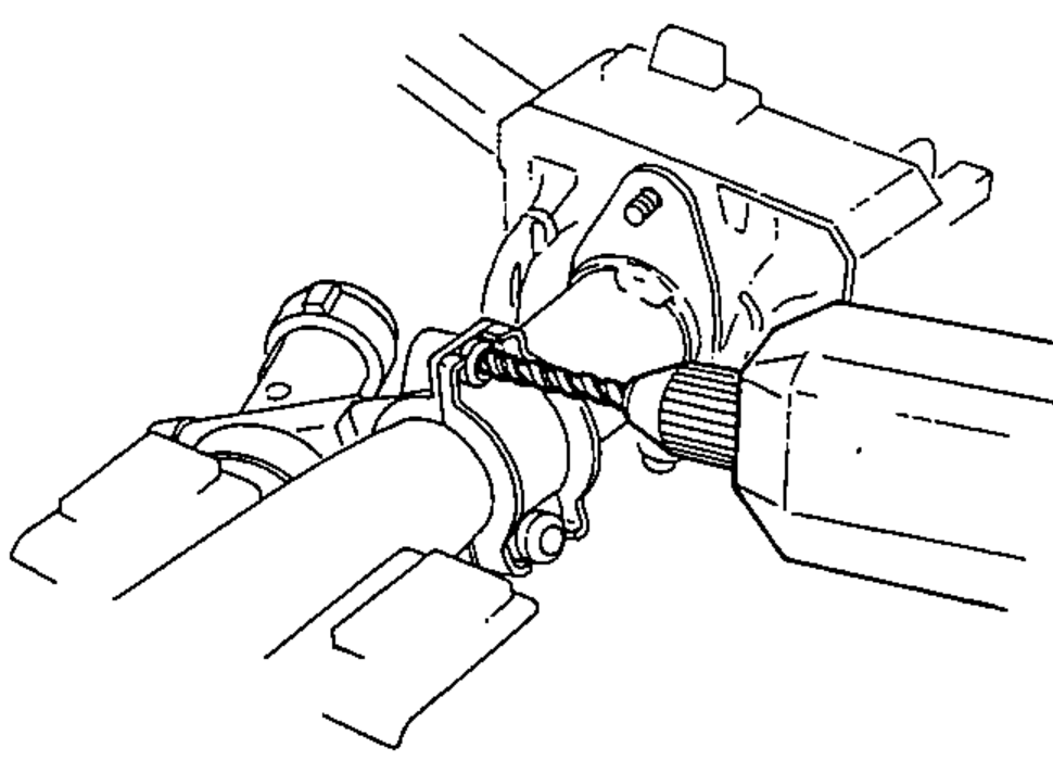 Ignition switch / steering lock body clamped on the steering column showing the shear bolts being drilled / removed.
