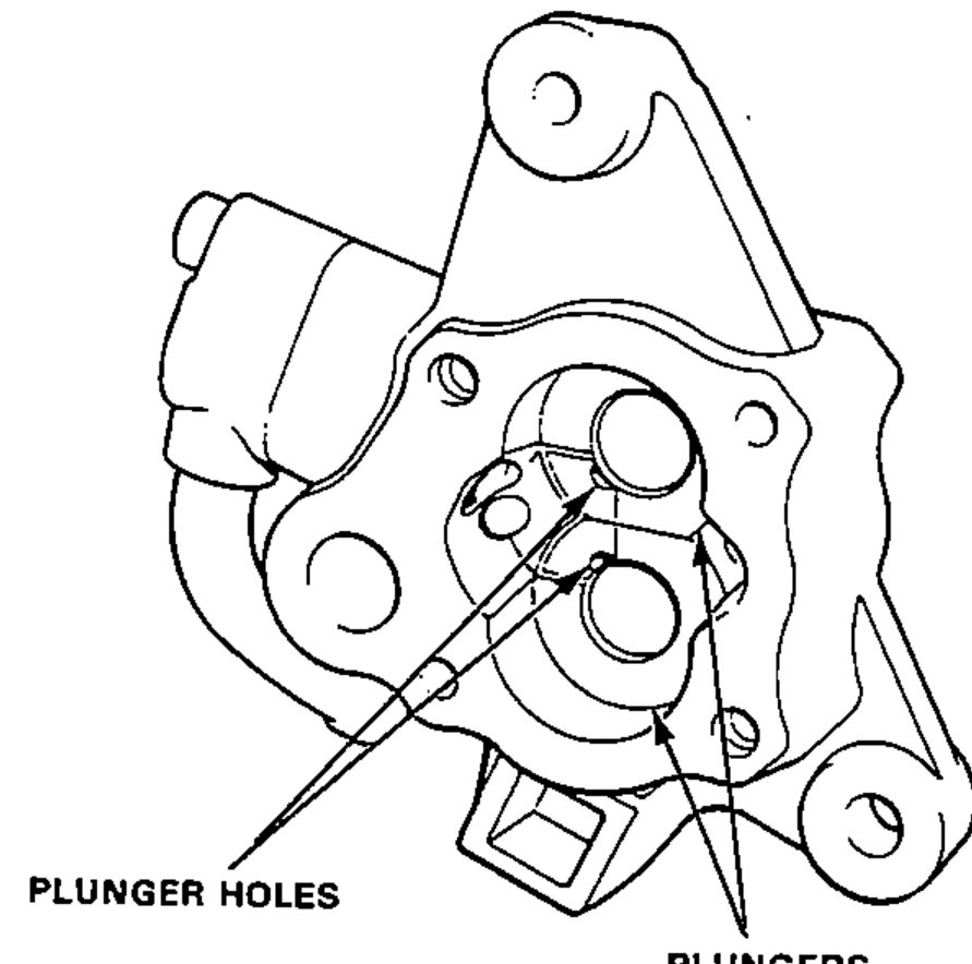 Face view of the pump housing showing the plunger holes with the plungers installed and correctly positioned.