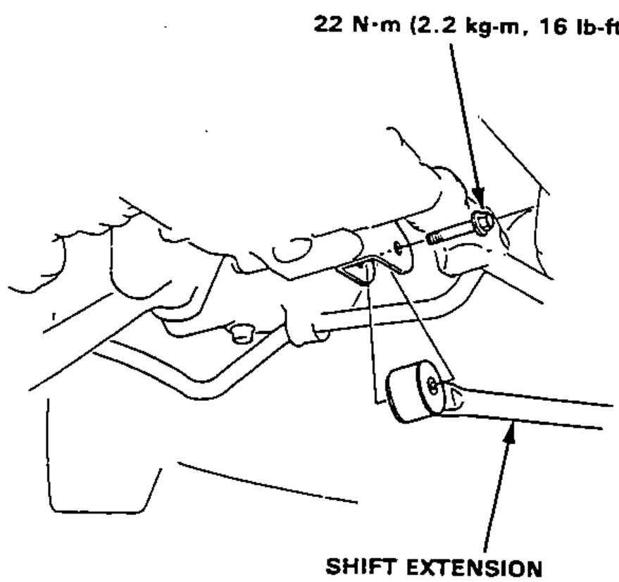 Illustration of the shift extension at the transmission case with mounting bolt tightening torque called out.