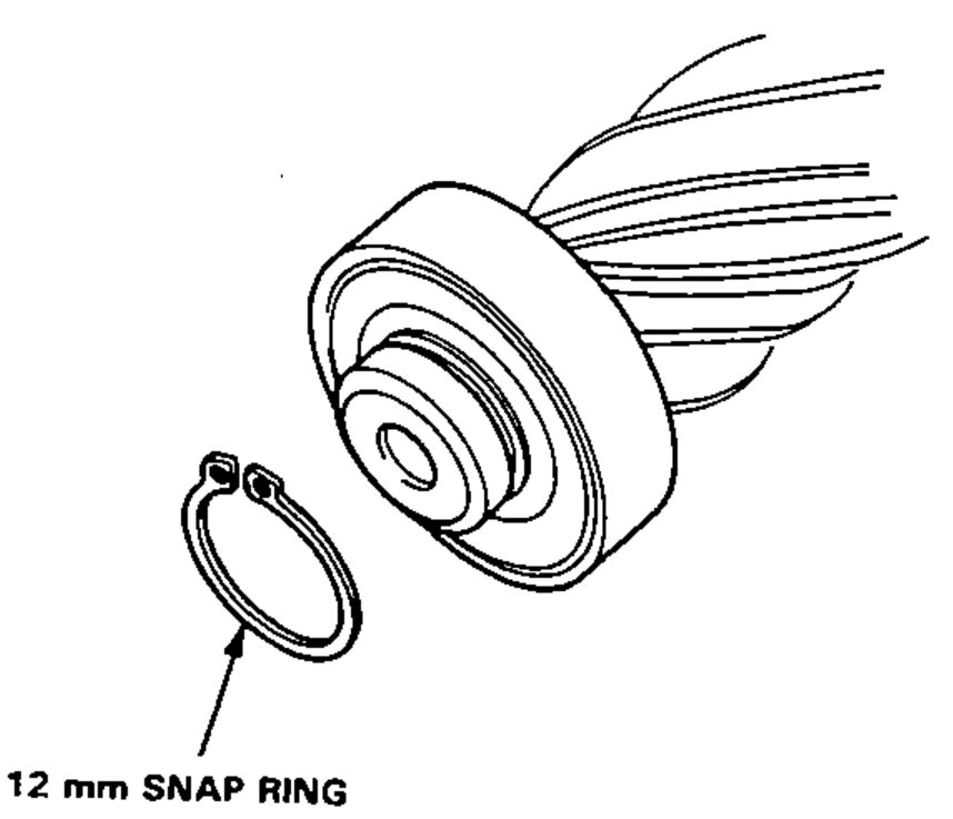 Steering pinion with lower ball bearing, showing the 12 mm snap ring being installed.