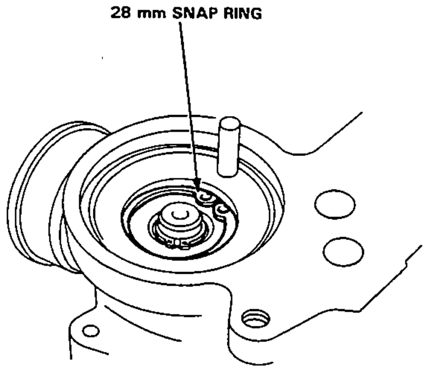 Pinion holder with the 28 mm snap ring being installed in the pinion holder groove.