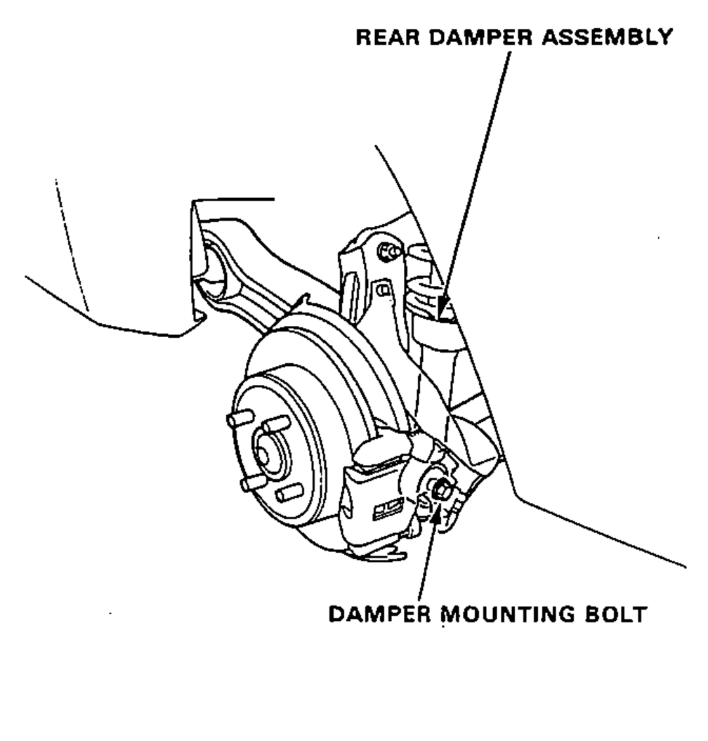 Rear damper assembly at the lower mounting, showing the damper mounting bolt at the knuckle/lower arm.