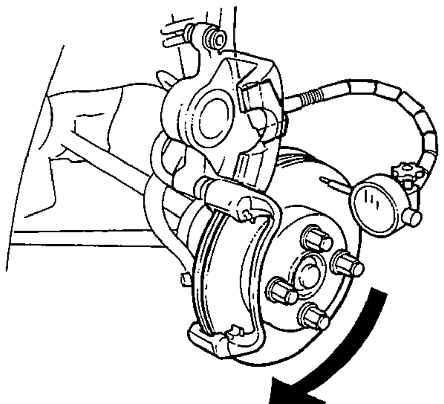 Front brake assembly with the caliper pivoted up and a dial indicator mounted against the disc to measure run-out; the disc is held to the hub by lug nuts.