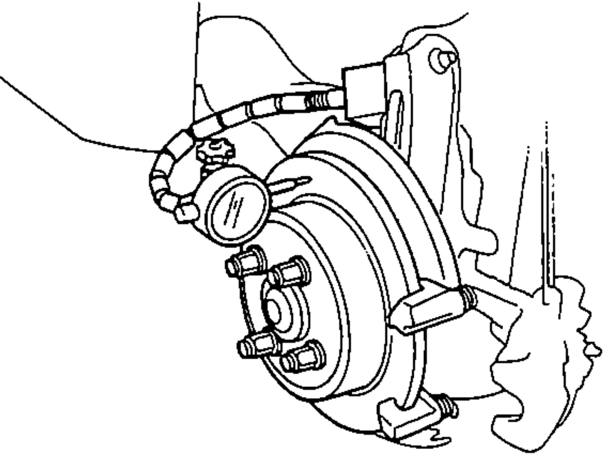 Front brake disc with a dial indicator mounted to measure disc run-out at 10 mm from the outer edge, disc held with wheel nuts and washers.