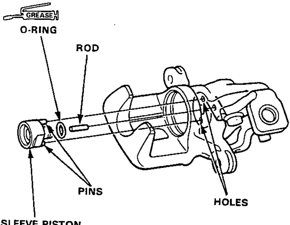 Exploded/cutaway view of the rear caliper showing the sleeve piston, rod and O-ring being installed so the hole in the bottom of the piston aligns with the rod in the cam and the two pins align with the holes in the caliper.