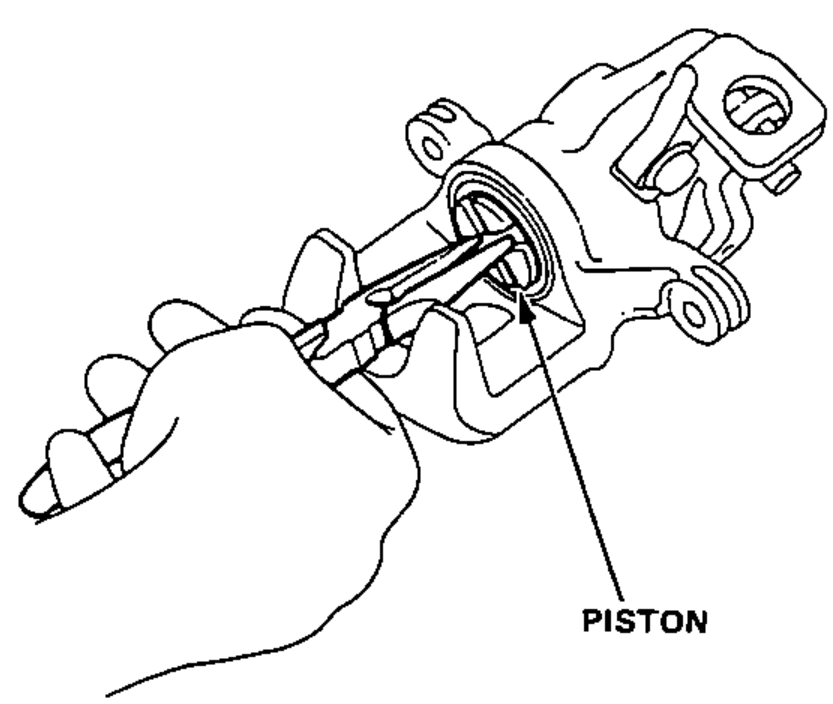 Hand coating the outside of the piston with silicone grease and installing it on the adjusting bolt while rotating it clockwise into the caliper.