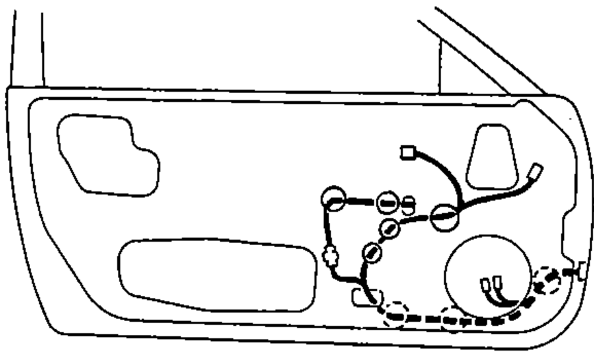 Inner door panel showing the correct routing of the wire harness and the clip locations for fixing it to the door.