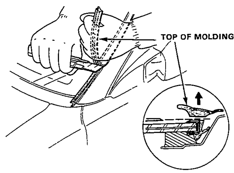 A hand cutting the top rubber portion off the side of the windshield molding with a knife, with an inset cross-section showing the cut at the top of the molding.