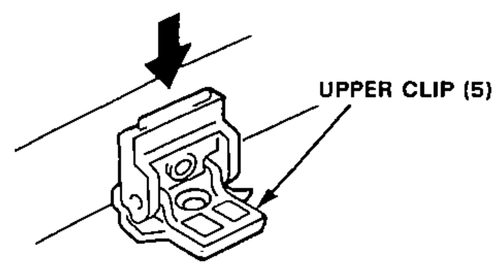 Detail of installing an upper clip onto the body flange, with a downward installation arrow.