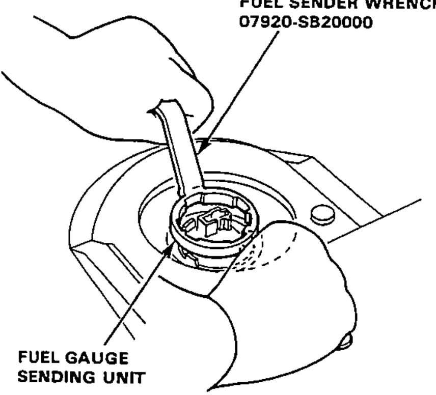 Illustration of removing the fuel gauge sending unit from the fuel tank access opening using the fuel sender wrench.